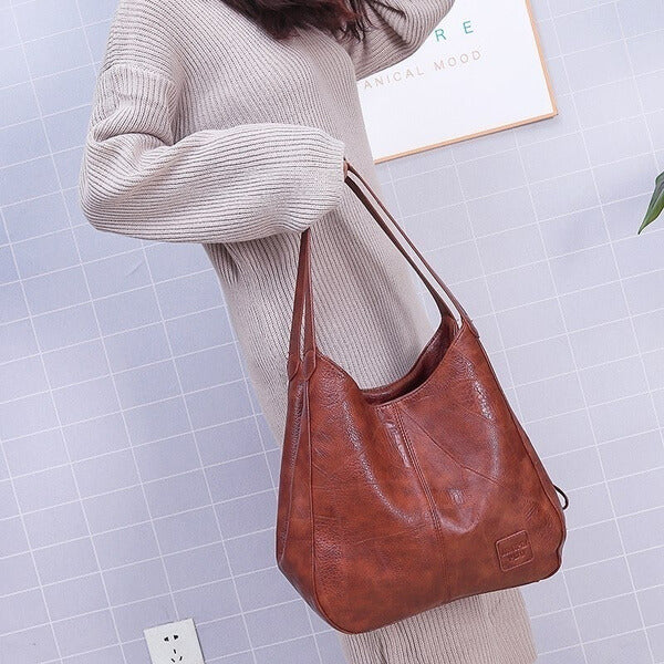 LuxeSlouch – Vegane Slouchy Schultertasche aus Leder