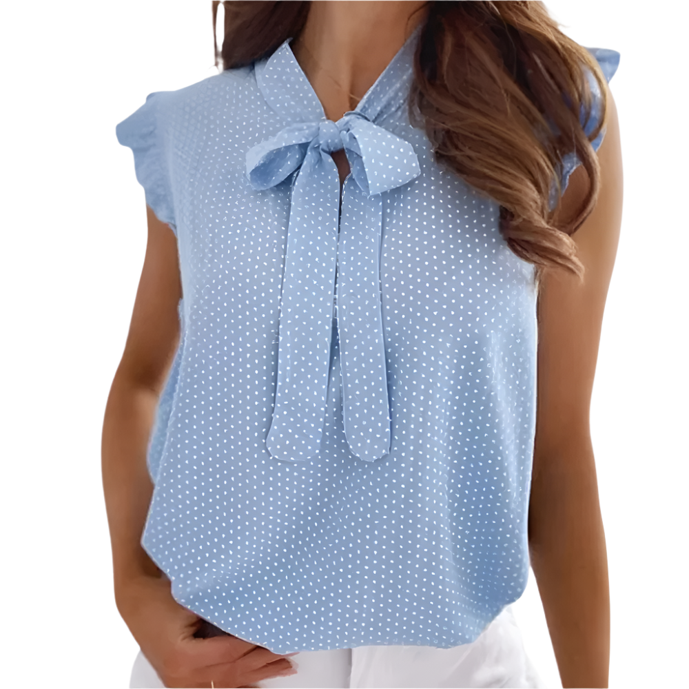 Kira - Gepunktete Bluse mit Rüschenausschnitt und Schmetterling-Detail