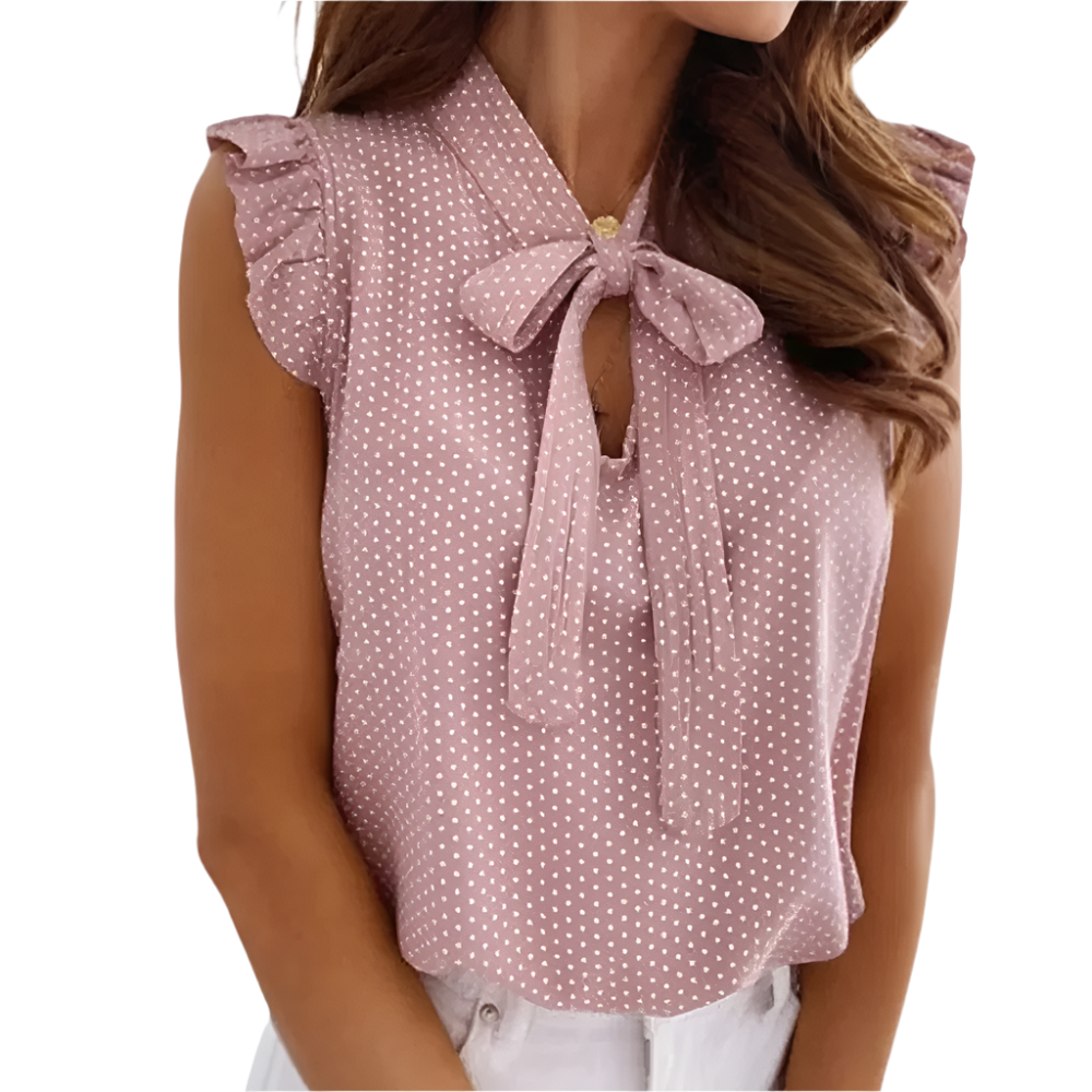 Kira - Gepunktete Bluse mit Rüschenausschnitt und Schmetterling-Detail