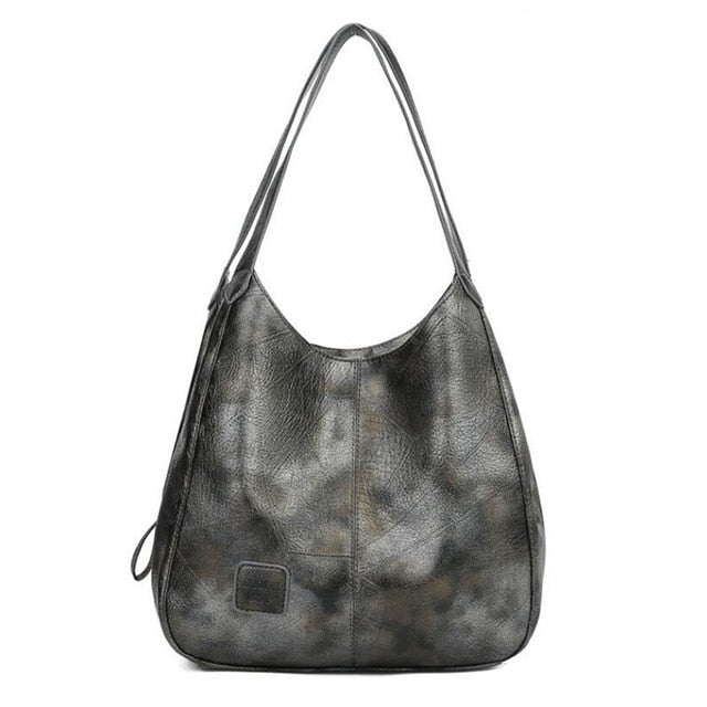 LuxeSlouch – Vegane Slouchy Schultertasche aus Leder