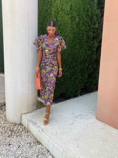 Bella - Lebhafte blumige Midikleid mit Puffärmeln