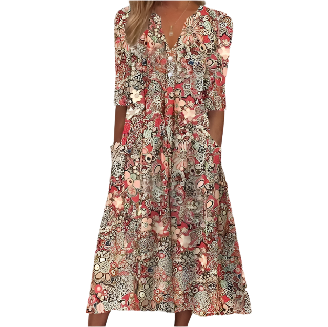 Niki - Unbeschwertes blumenbedrucktes Midikleid mit aufgesetzten Taschen