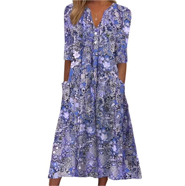 Niki - Unbeschwertes blumenbedrucktes Midikleid mit aufgesetzten Taschen