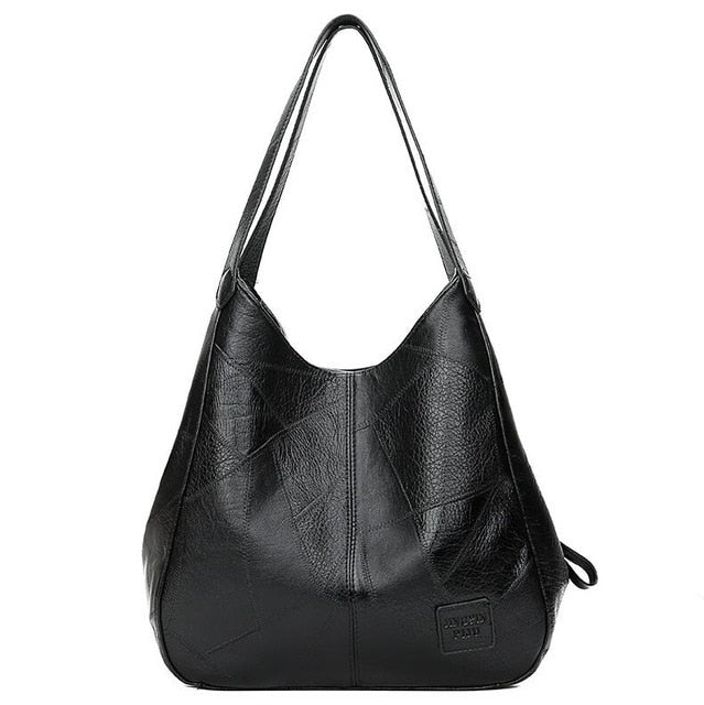 LuxeSlouch – Vegane Slouchy Schultertasche aus Leder