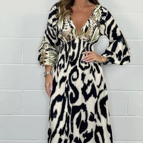 Bella - Fließendes Maxikleid mit abstraktem Druck